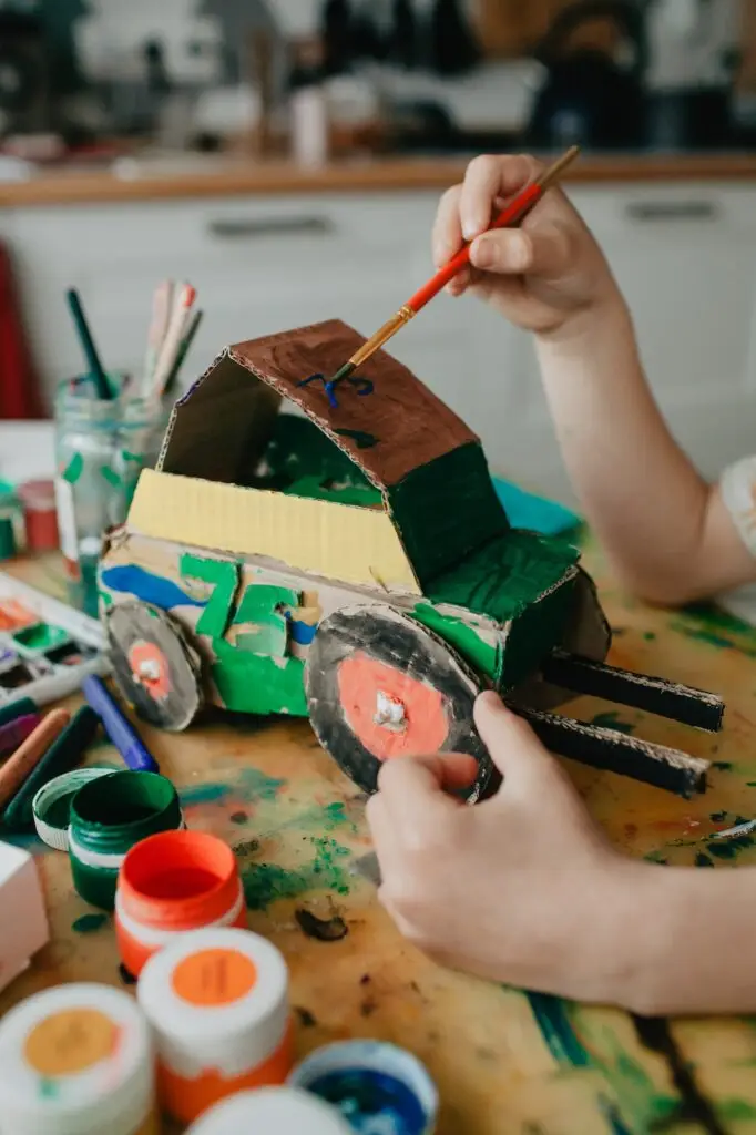 The craft made of cardboard by the hands of a child.